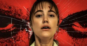 Cena do filme Longlegs: Vínculo Mortal com Nicolas Cage e Maika Monroe
