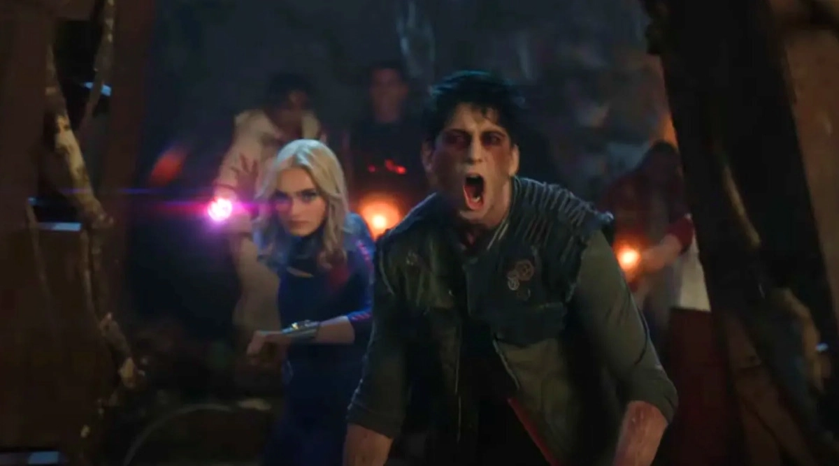 Zed gritando e Addison usando magia em momento de tensão em Zombies 4