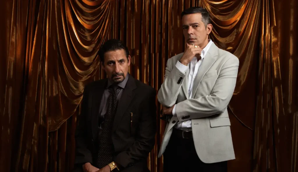 Personagens do clã Saad em Os Donos do Jogo diante de fundo dourado, simbolizando poder e influência