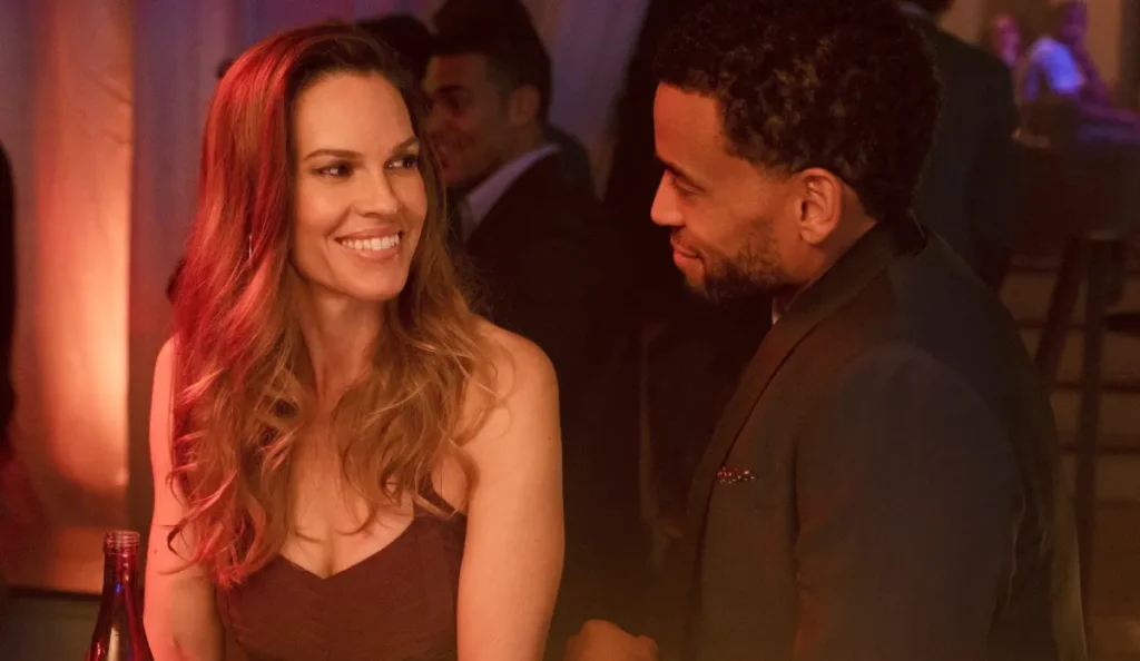 Hilary Swank e Michael Ealy em cena do thriller Perdas e Danos
