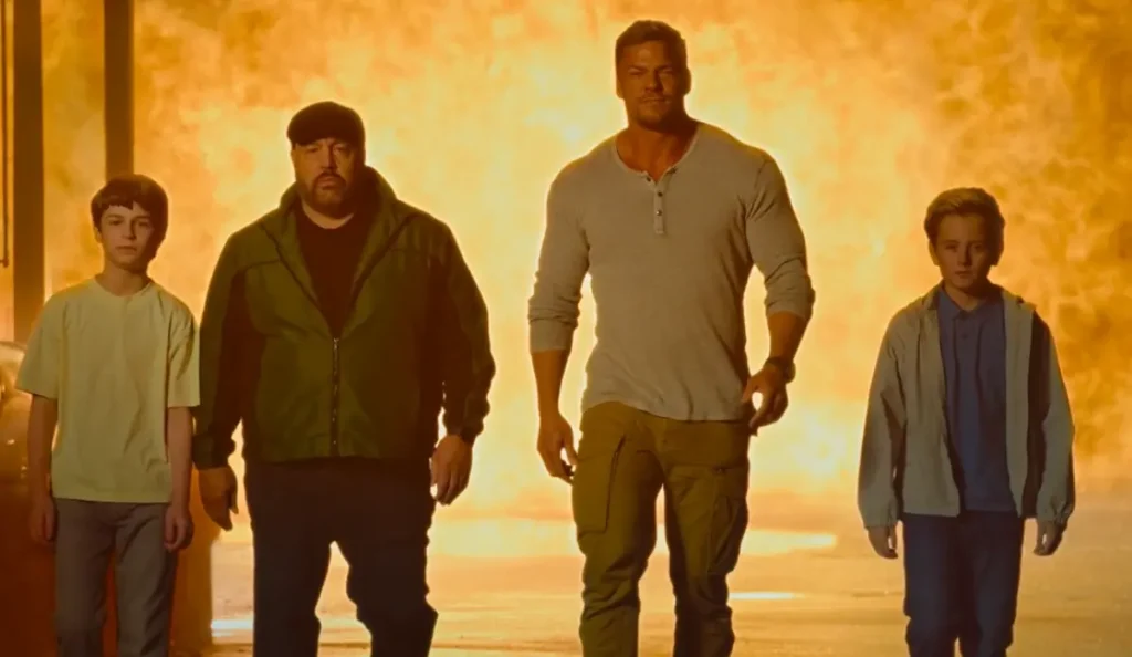 Jeff, Brian e as duas crianças caminham após a explosão no clímax de Um Dia Fora de Controle, do Prime Video.