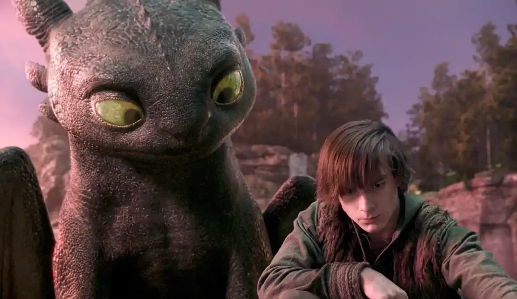 Cena do filme Como Treinar o Seu Dragão live-action 2025, com Soluço e Banguela