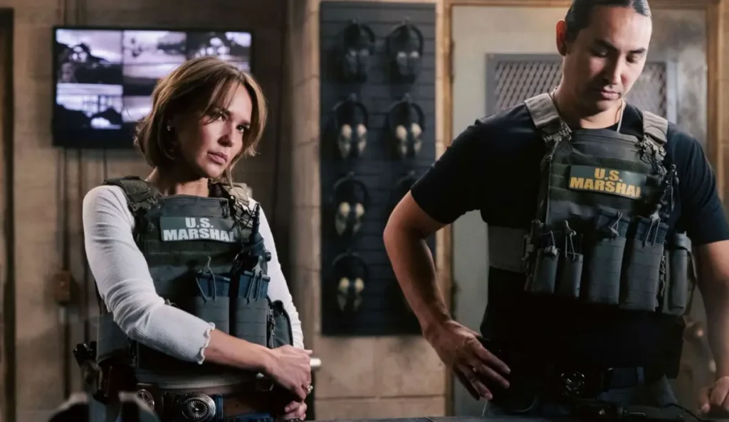 Equipe de Marshals reunida durante investigação no episódio 4