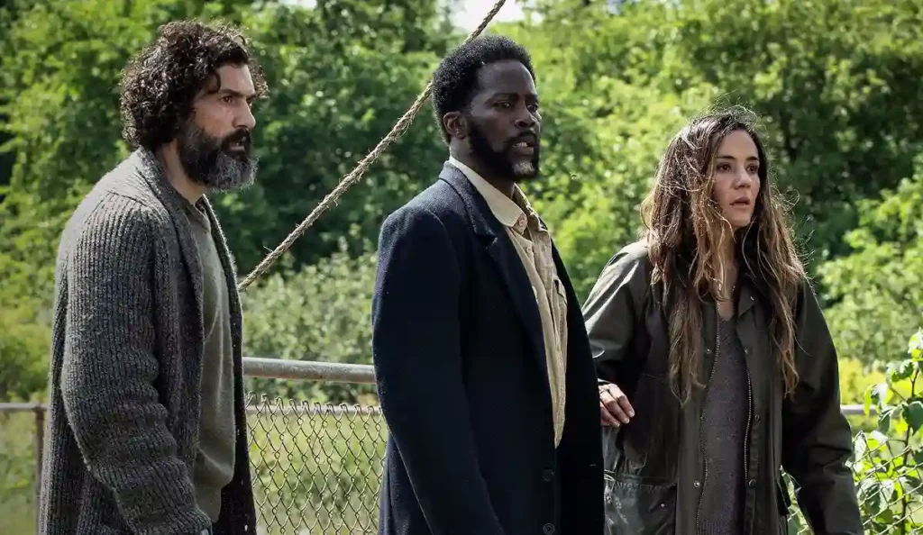 Cena da 4ª temporada da série Origem com personagens reunidos na cidade misteriosa