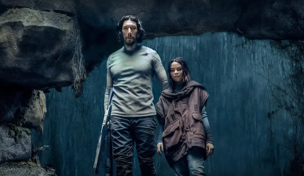 Adam Driver e Ariana Greenblatt em cena do filme 65: Ameaça Pré-Histórica