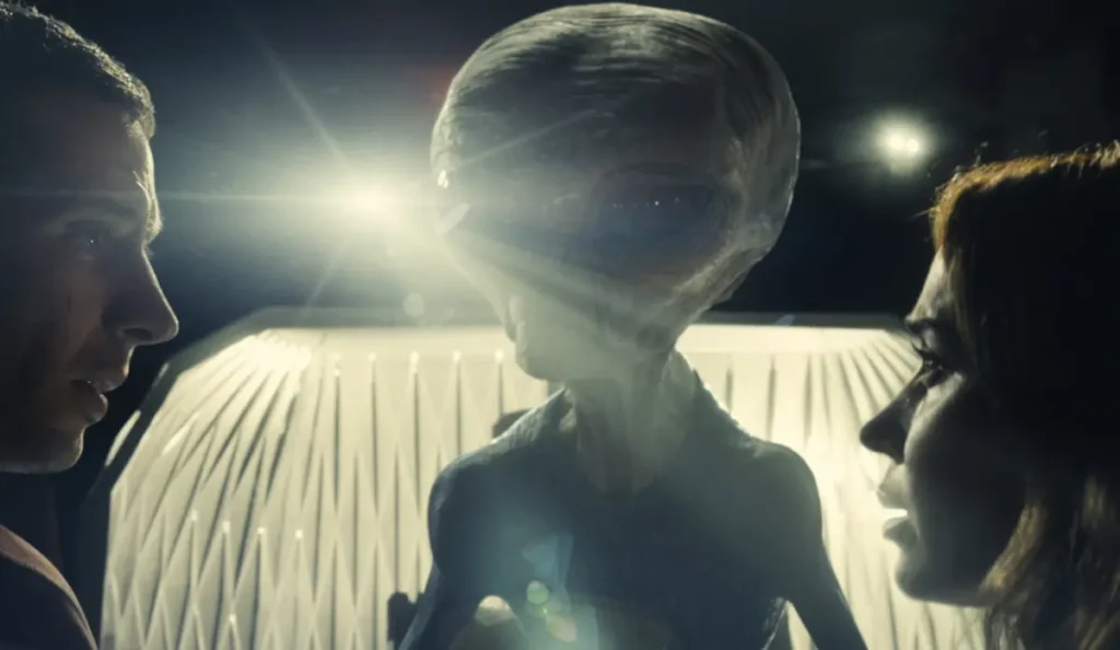 Cena de Dia D mostra a transmissão que revela a existência de alienígenas ao mundo