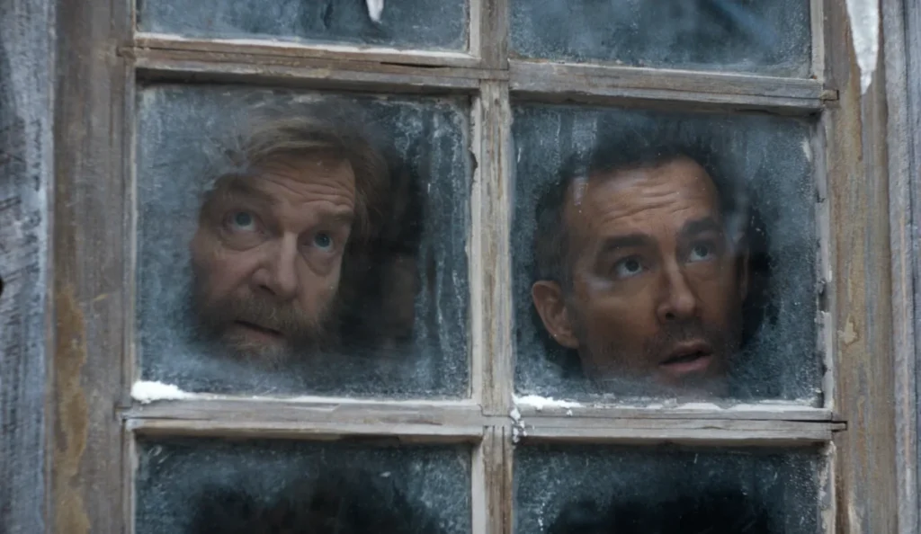 Ryan Reynolds como Troy Kelly no final do filme Mayday