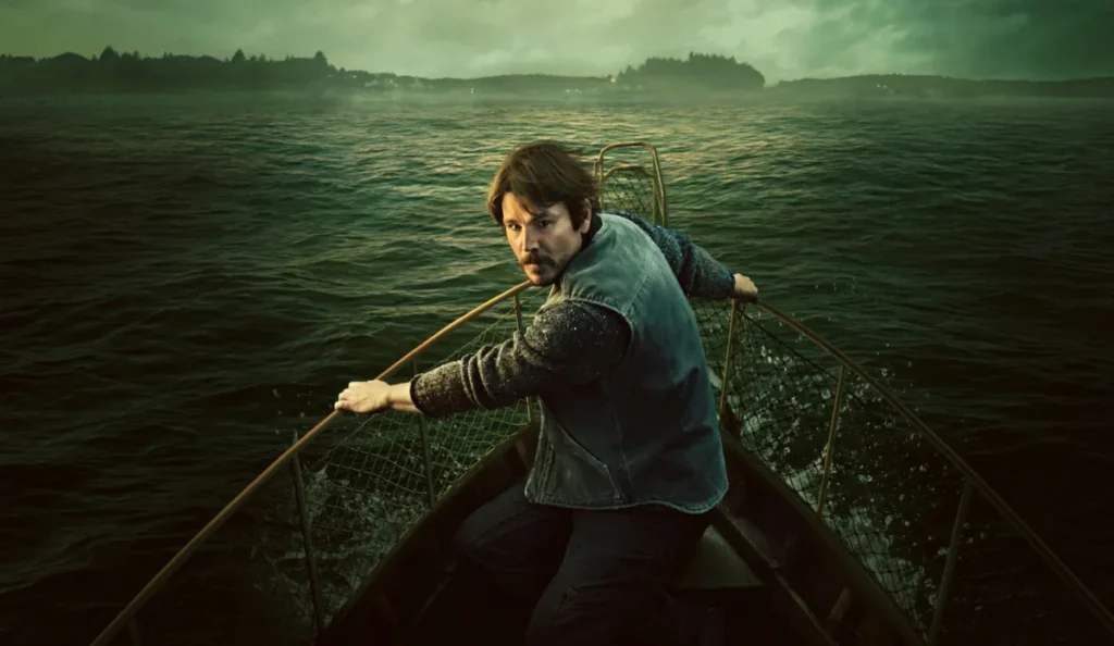 Cena da série Profundezas mostra o ambiente costeiro onde se desenvolve o mistério da produção da Netflix.
